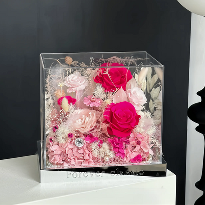 LULU ROSÉE pink flame barbie acrylic box in a chic bedroom