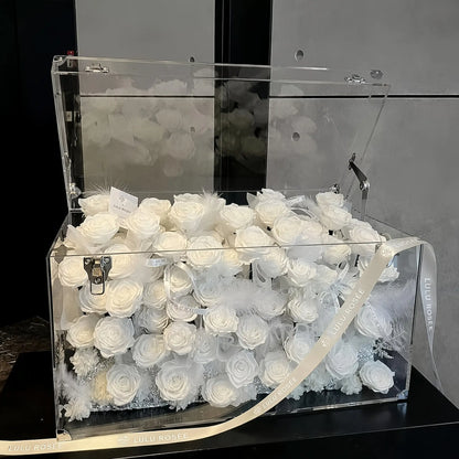 LULU ROSÉE Grande Eternal Acrylic Handbag Rose Box, luxury handbag-shaped transparent acrylic gift box filled with pure white preserved roses, minimalist clean design, customizable flower colors, romantic everlasting floral souvenir for anniversary & birthday gifting