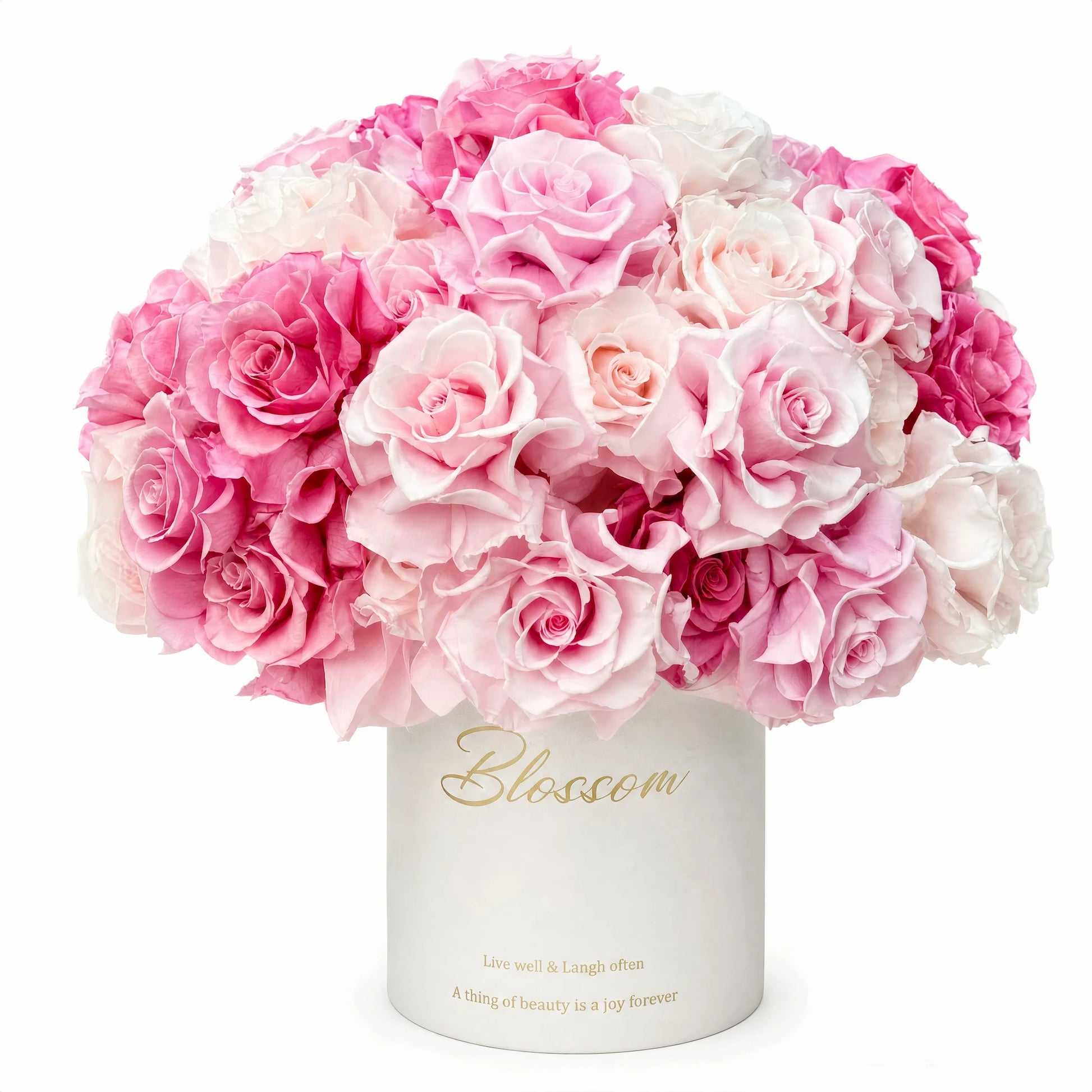 LULU ROSÉE Monochrome Pink Rose Garden Bucket, Preserved Rose Arrangement on a white background