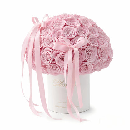 LULU ROSÉE Pink Forever Rose Bucket on Mirror Base, Luxury Preserved Flower Arrangement on a white background